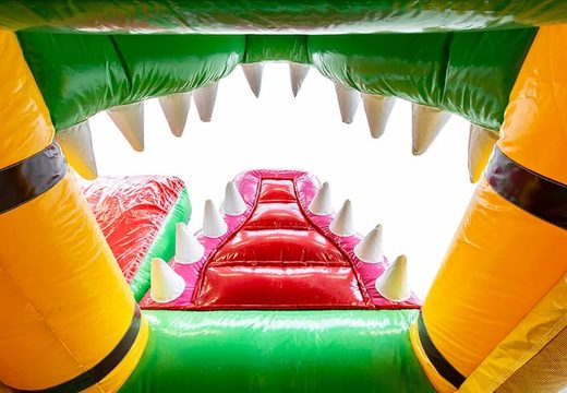 Nadmuchiwany dmuchany zamek z motywem krokodyla ze zjeżdżalnią i obiektami 3D dla dzieci. Kup dmuchane zamki online w JB Dmuchańce Polska