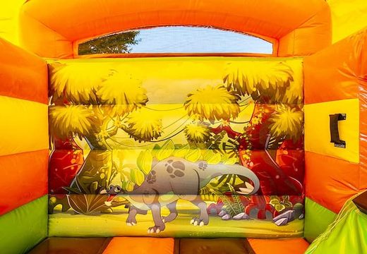 Kup mały zadaszony, wielofunkcyjny dmuchany zamek ze zjeżdżalnią w kolorze pomarańczowym i zielonym w motywie dinozaura. Kup dmuchane zamki w JB Dmuchańce Polska online