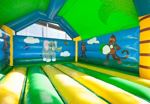 Duży super dmuchany zamek pokryty wesołymi animacjami w motywie Jungle dla dzieci. Zamów dmuchane zamki online w JB Dmuchańce Polska