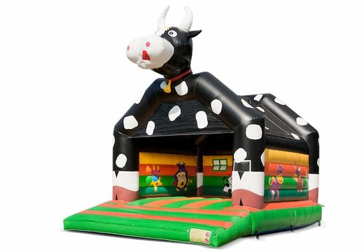 Duży dmuchany zamek do skakania z dachem w motywie krowy na sprzedaż dla dzieci. Dostępne w JB Dmuchańce Polska online
